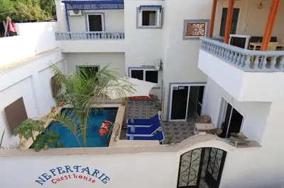 an aerial view of a building with a balcony at Nefertarie Guest House in Luxor