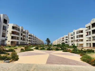 a view of an apartment complex with buildings at 2bedroom apartment in Summer Land Beach Resort in Hurghada