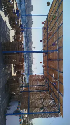 a reflection of a building under construction in the water at Mostafa Jamaica guesthouse in Aswan