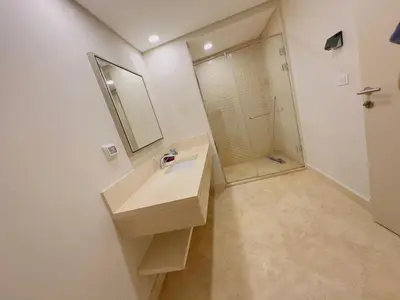 a bathroom with a sink and a shower at Mangrovy 2 BR Gouna in Hurghada