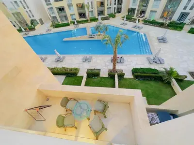 an overhead view of a swimming pool in a building at Mangrovy 2 BR Gouna in Hurghada