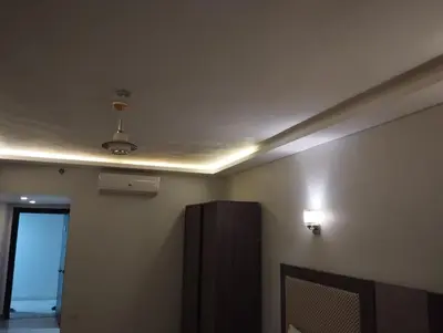 a room with a ceiling with a light on it at Cecelia Resort in Hurghada