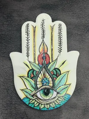 an illustration of an all seeing eye on a holder at Oasis resort-Nice Condo -B31-Al Ahyaa - Hurghada in Hurghada