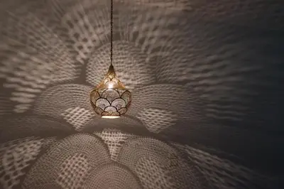 a chandelier hanging from a ceiling in a room at Luxury Ground Floor Appartment , BEST mountain views! near Temples in Luxor