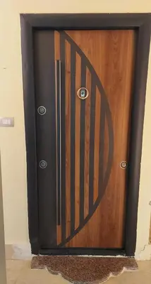 a wooden door with a metal grate on it at STAR HOME HURGHADA ARABIA in Hurghada