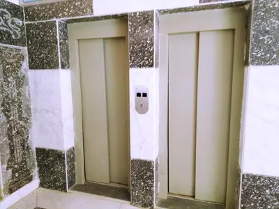 a couple of doors in a wall in a room at Studio pool view next to the Marina,Sheraton Plaza 320 in Hurghada