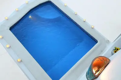 a window on a boat with blue water at Benben by Dhara Hotels - Adults Only in Aswan