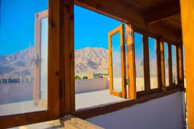 an open window with a view of a mountain at Rose Guest House \u60a8\u5728\u76e7\u514b\u7d22\u7684\u7b2c\u4e8c\u500b\u5bb6 in Luxor