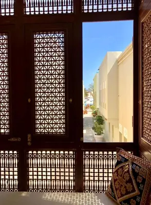 a window in a building with a view of a street at El Gouna abo tig marina 1 bedroom apartment and 1 bedroom at the Roof in Hurghada