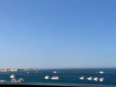 a group of boats in the water on the ocean at Marvel flat in Hurghada