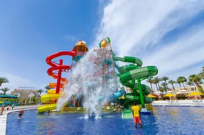 a water park with a water slide in the water at Beach Albatros The Club - Aqua Park in Hurghada