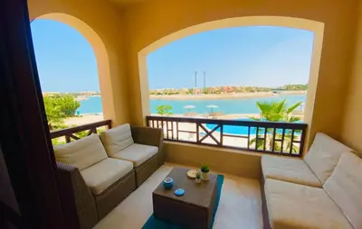 a living room with a view of the water at Babel Apartments Hotel El Gouna in Hurghada