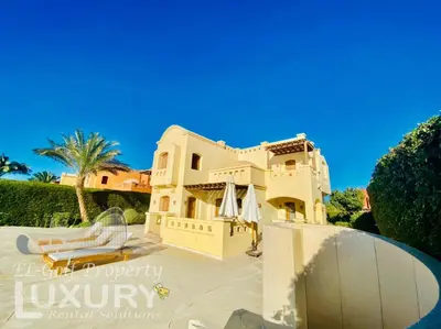 a large house with a patio in front of it at Private Villa Y51 - 3 BedRooms at El-Gouna in Hurghada