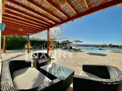 a villa with a view of the swimming pool at Villa 9 ph-5 with 4 Bed Room in Hurghada