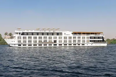 a large white cruise ship on the water at Jaz Viceroy Nile Cruise - Every Saturday from Luxor for 07 & 04 Nights - Every Wednesday From Aswan for 03 Nights in Luxor