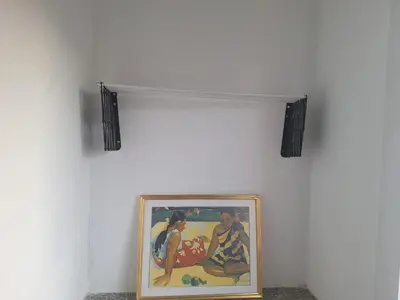 a painting hanging on a wall in a room at new marina heart of Hurghada in Hurghada
