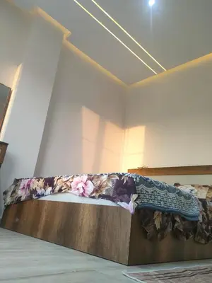 a bed in a room with at la vi -panorama sea in Hurghada