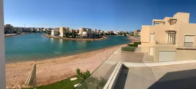 a view of a river in a city with buildings at Tawila, 4 Bedroom Villa, Brand new, directly on a lagoon in Hurghada