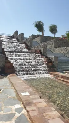a set of stone steps with a water fountain at Villa for you on your own in Makadi Heights, Hurghada, Read Sea, Egypt in Hurghada