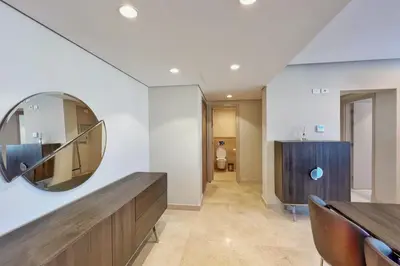 a bathroom with a mirror on the wall at Homestyle 3BR Penthouse Pool & Beach View in Hurghada