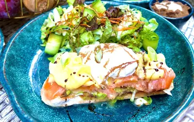 a blue plate of food with a salad on it at Imperial Resort Hurghada in Hurghada