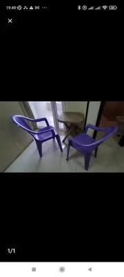 two pictures of a purple chair and a table at Прекрасная студия в комплексе с бассейном рядом с бесплатным пляжем in Hurghada