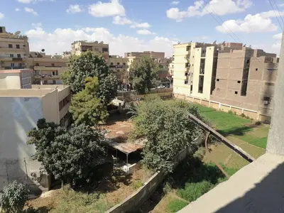 a view of a city with trees and buildings at Fontana Hostel luxor in Luxor