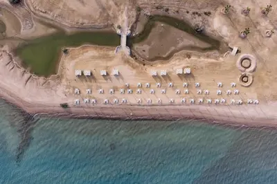an aerial view of a resort on the beach at Boho Mint 1 BDR Mangroovy Pool & Sea View in Hurghada