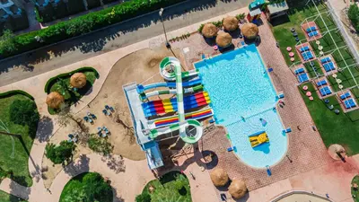 an overhead view of a pool at a theme park at Sunrise Alma Bay Resort in Hurghada