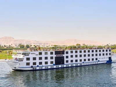 a large white cruise ship on the water at Mövenpick Royal Lily Nile Cruise, Every Monday Four Nights From Luxor, Every Friday Three Nights From Aswan - Including Excursions & Sightseeing in Luxor