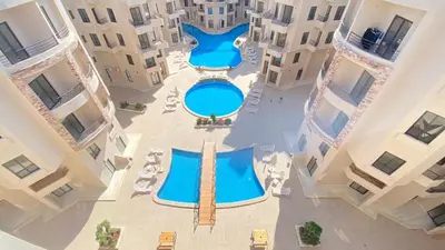 an overhead view of a swimming pool in a building at Luxury Aqua Tropical Resort Next To Al Gouna 4 0 1 in Hurghada
