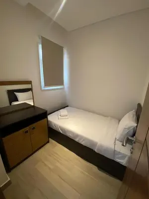 a small room with a bed and a mirror at Stayr Somabay - Bay Life Home Rentals in Hurghada