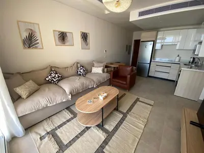 a living room with a couch and a table at Stayr Somabay - Bay Life Home Rentals in Hurghada