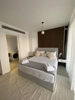 a bedroom with a large bed in a room at Stayr Somabay - Bay Life Home Rentals in Hurghada