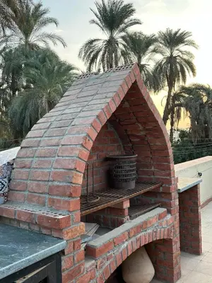 a brick oven sitting on top of a table at The Residence in Luxor