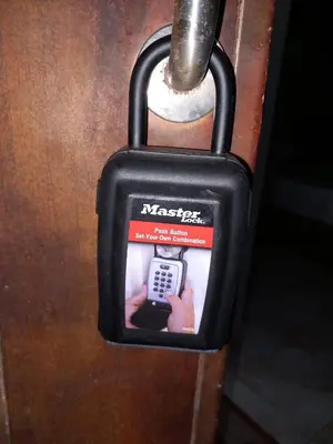a suitcase with a picture of a person holding a cell phone at Fully furnished Studio, At Tiba View, NUMBER R75 in Hurghada