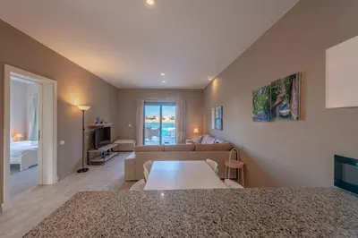 a living room with a couch and a table at 3BR Family Villa in Sabina, El Gouna. Lagoon & Private Pool in Hurghada