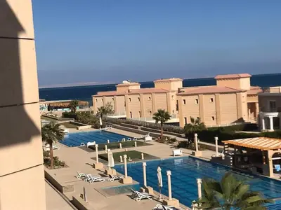 a view of a resort with a large swimming pool at Selena Bay Resort luxury 1 bedroom Apartments in Hurghada