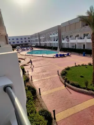 a view of a swimming pool in a building at منتجع سيسيليا cecelia resort in Hurghada