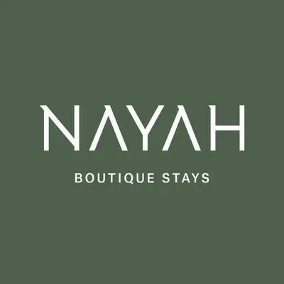 a logo for the naykh boutique stays at Nayah Stays, Amazing villa with private pool & 5 master suites in Hurghada