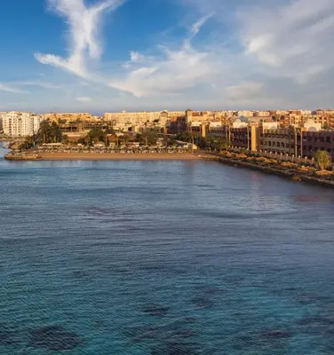 a view of a large body of water with buildings at New Eagles Downtown Zahabia Resort & Aqua Park in Hurghada