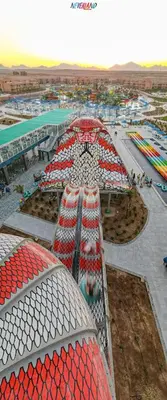 an aerial view of a building with red roofs at Neverland City Hurghada - Pickalbatros in Hurghada