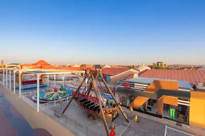 an overhead view of a water park with a roller coaster at Neverland City Hurghada - Pickalbatros in Hurghada