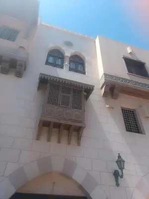 a building with two windows on top of it at Tawaya sahl hashesh in Hurghada