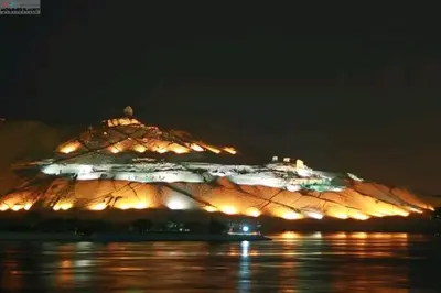 a snowy mountain with lights on it at night at Rema Nubian Guest House in Aswan