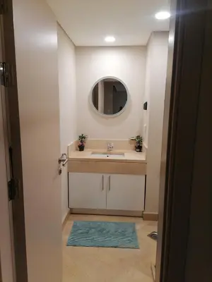 a bathroom with a sink and a mirror at Mangarovy El Gouna in Hurghada
