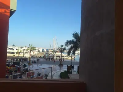 a view of a beach from a hotel window at new marina . your best choice for family in Hurghada