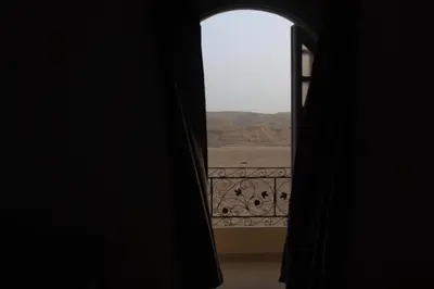 a window with a view of a desert view at Royal Mountain in Luxor