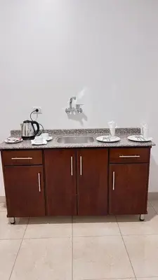 a bathroom counter with a sink in a room at Mikhaila Guest House in Luxor