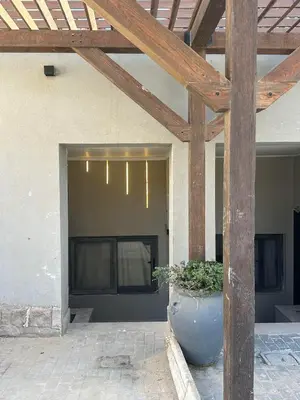 a large vase sitting in front of a building at Cheapest studio at El-Gouna - Bali compound in Hurghada
